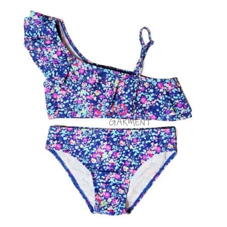 Vorderansicht eines indigoblauen Tankini-Sets für Mädchen mit asymmetrischer Ein-Schulter-Rüsche und Wildblumen-Mikroprint.