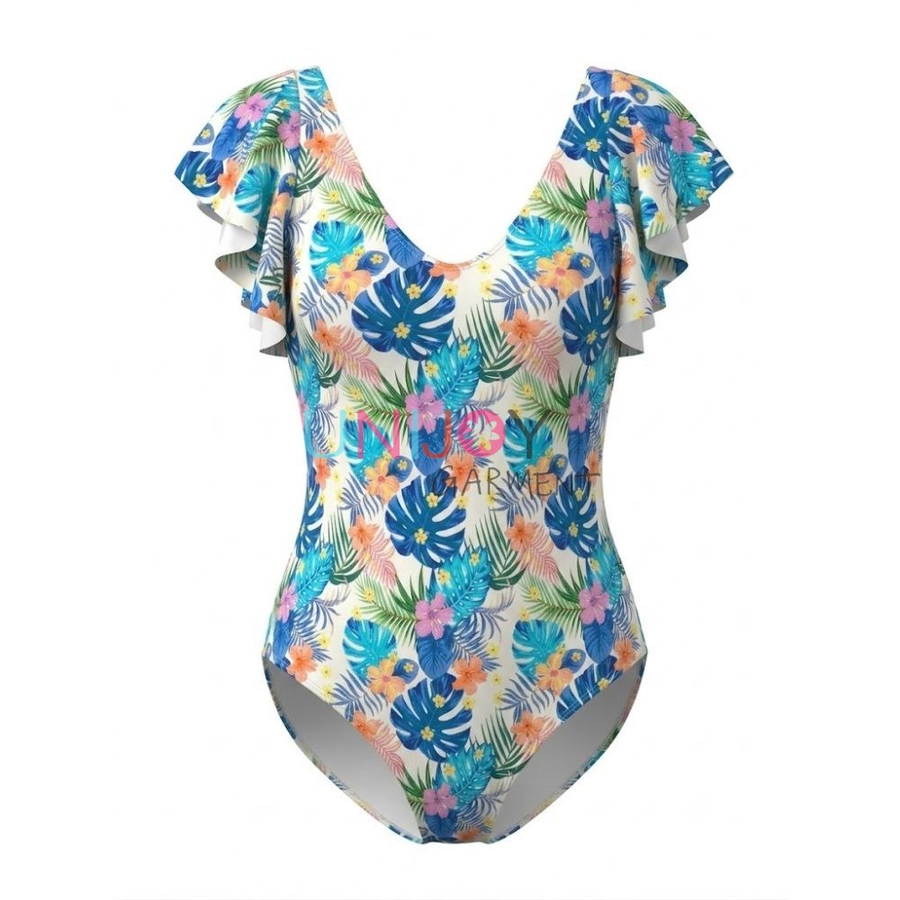 Mono de mujer con escote en V profundo, mangas acampanadas y estampado floral tropical.