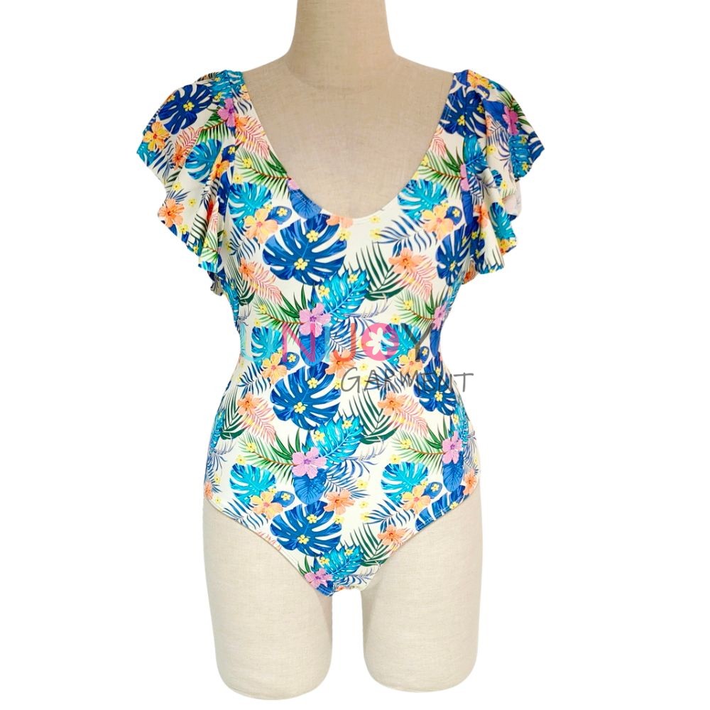 Mono de una pieza con escote en V profundo, mangas acampanadas y estampado floral tropical.